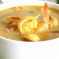Jhinga Malai Curry · Tiger prawns | simmered in coconut & cream sauce.