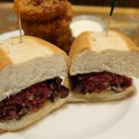 Hot Pastrami · Lots of lean pastrami with dill pickle on a hoagie roll.