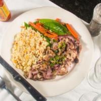 Y. Steak Plate · broiled, topped with sautéed mushrooms & onions with rice pilaf & sautéed seasonal vegetables