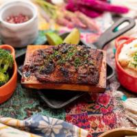 Grilled Cedar Plank Blackend Salmon · wester ross premium scottish salmon filet spice roasted on cedar wood dressed with lime and ...