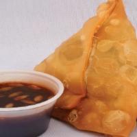 Samosa · Triangular savory pastry fried in ghee or oil, containing spiced vegetables.