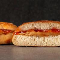 Pb&J Sandwich · peanut butter & jelly served on fresh baked focaccia bread with choice of kid's side