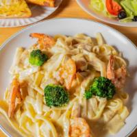 Fettuccine Alfredo With Shrimp · Served with garlic bread and salad.