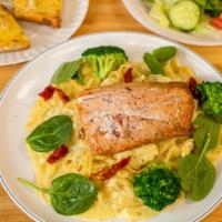 Fettuccine Alfredo With Salmon · Served with garlic bread and salad.