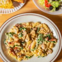 Fussilli Ricotta With Chicken · Served with garlic bread and salad.