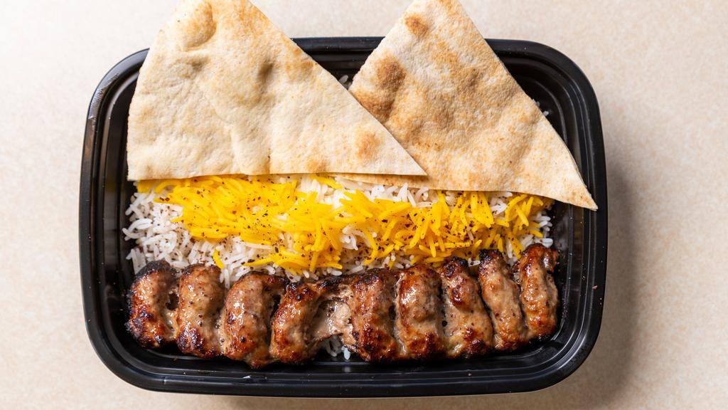 Koobideh · Juicy char broil seasoned ground beef, marinated in our signature saffron seasoning, served with rice,  and hummus.