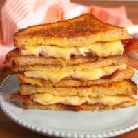 Breakfast Toastie · The best breakfast Toastie in Los Angeles! Texas toast piled high with bacon, cheese and a f...