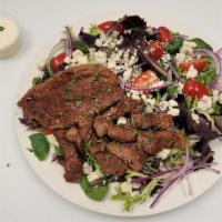 Grilled Picanha Salad · Spring mix, Blue cheese, Grilled picanha (Prime top sirloin),  Baby tomato, Red onions,