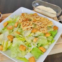 Caesar Salad · Romaine, Parmesan cheese, garlic croutons, Caesar dressing on top.