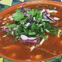 Pozole · Traditional hominy stew, chile broth with vegan chicken and beef, served with corn tostadas,...