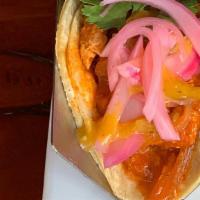 Chick'N Tinga Taco · topped pickle red onions