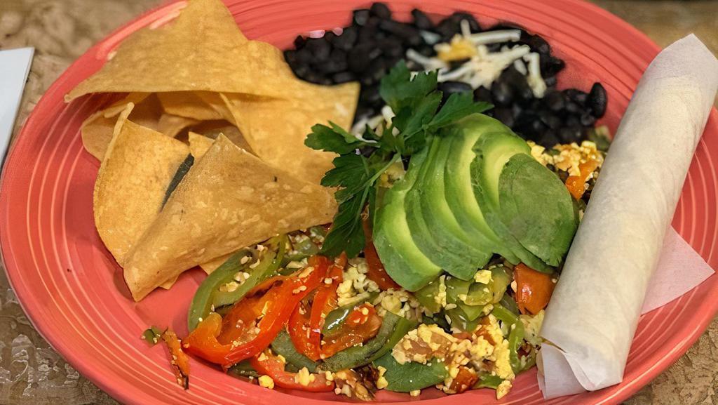 Gluten Free Huevos A La Mexicana Breakfast · Tofu scramble, onions, red and green bell peppers, tomatoes, jalapenos & avocado. Served with black beans & corn tortilla.