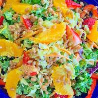 Kale Salad · Vegan. Kale, cabbage, beans, red bell peppers, carrots, spelt berries and strawberries in a ...