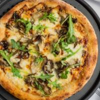 Funghi Pizza · Fior di latte mozzarella, fontina, sottocenere al tartufo, maitake mushrooms, burnt shallots.