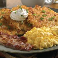 Bacon And Onion Potato Pancakes Combo · A Carrows signature! Three crispy potato pancakes  loaded with applewood-smoked bacon and on...