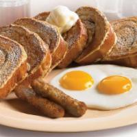 Grandma'S Cinnamon Loaf French Toast Combo · A cinnamon loaf sliced thick and dipped in a rich egg batter, then grilled to a golden brown...