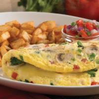 Vegetable Omelette · Sauteed mushrooms, broccoli, diced Roma tomatoes, onions, and red and green bell peppers all...