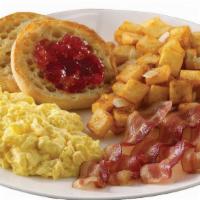 Your Choice Breakfast · Start with two farm-fresh eggs and add your choice of four strips of applewood-smoked bacon,...
