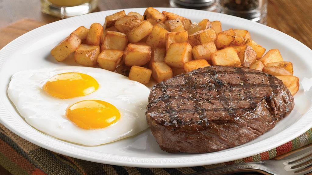 Top Sirloin Steak & Eggs · A tender, seasoned 8 oz. top sirloin steak paired with two farm-fresh eggs. Served with crispy hash browns, country potatoes or fruit and choice of two buttermilk pancakes, fresh-baked biscuit, toast or English muffin.