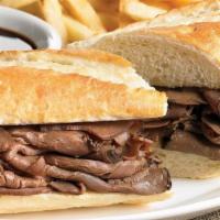 French Dip · A hearty portion of thinly sliced roast beef piled high on a toasted French roll, served wit...