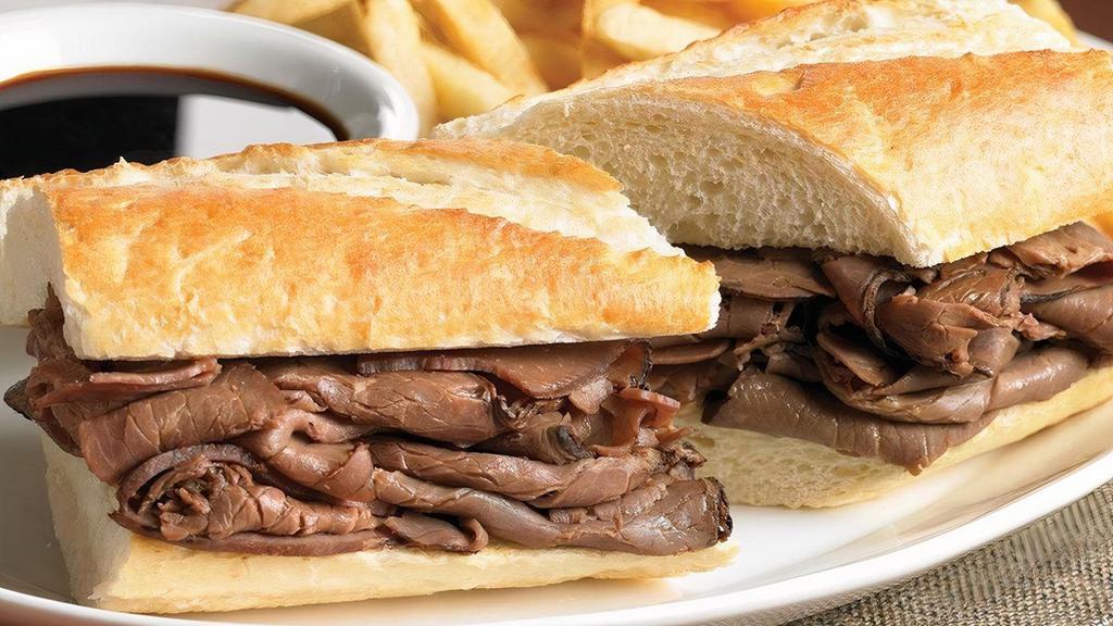 French Dip · A hearty portion of thinly sliced roast beef piled high on a toasted French roll, served with au jus for dipping. Served with choice of French fries, fresh garden salad, fresh fruit or coleslaw.