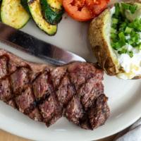 Petite New York Steak · A tender and juicy 6 oz. New York steak charbroiled and grilled to perfection. Served with c...