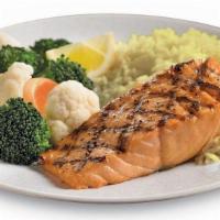 Grilled Atlantic Salmon · Cold-water salmon fillet served with choice of two dinner sides.