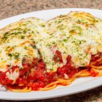 Chicken Parm Baked Dish · Breaded chicken, tomato sauce, topped with mozzarella, served over spaghetti.
