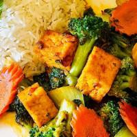 Vietnamese Stir (Serves 10) · a fresh stir fry of bok choy, broccoli, carrots, & fried tofu served over rice. Optional for...