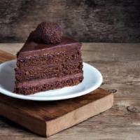 Chocolate Cake · A delicious three-layer chocolate cake, with fudge icing and filling.