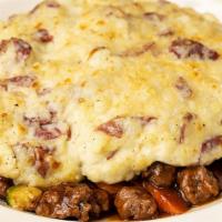 Shepherd'S Pie · Ground Beef, Carrots, Peas, Zucchini and Onions in a Delicious Mushroom Gravy Covered with a...