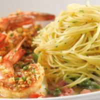 Skinnylicious® Lemon-Garlic Shrimp · Sautéed Shrimp, Basil, Tomato and Lemon-Garlic Sauce. Served with Asparagus and Angel Hair P...