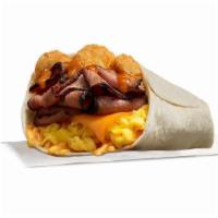 Primal Burrito · Slow cooked sliced prime rib, with hash rounds, smoked cheddar, scrambled eggs, sweet n savo...