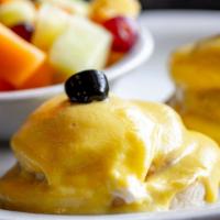Eggs Benedict · Canadian Bacon, Poached Eggs and Hollandaise Sauce on a Toasted English Muffin
