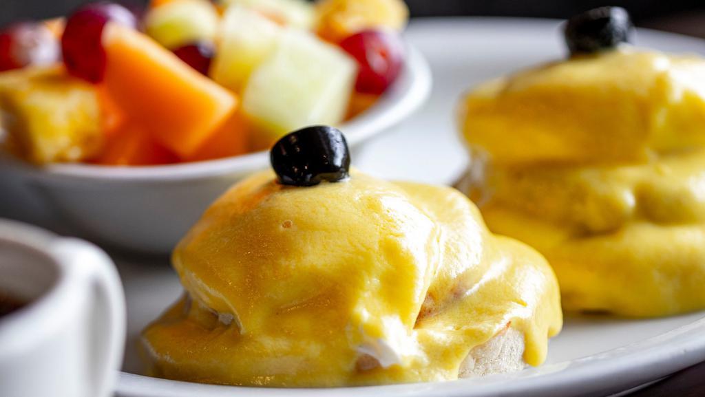 Eggs Benedict · Canadian Bacon, Poached Eggs and Hollandaise Sauce on a Toasted English Muffin