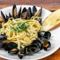 Mussels · Fettuccini pasta with mussels, pick your sauce Rosso or White wine with a touch of lemon and...