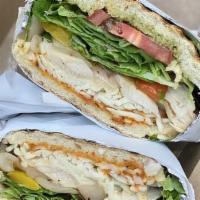 Grilled Chicken Campagnolo · Sundried tomato & pesto aioli grilled chicken, roasted peppers and onions, lettuce, tomato, ...