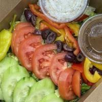 Greek Salad · Fresh romaine lettuce, cucumber, tomato, red onion, feta cheese, kalamata olives, red & yell...