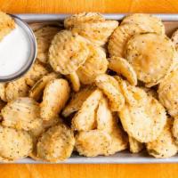 Fried Pickles · Sliced pickles, hand breaded to order, ranch.