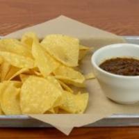 Chips & Salsa · Fire roasted salsa served warm with chips.