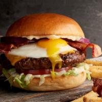 The Hangover · Fried egg, bacon, American cheese, lettuce, tomato, red onions, mayo, french fries. **Discla...