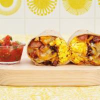 Carne Asada Breakfast Burrito · Two scrambled eggs, carne asada, breakfast potatoes, and melted cheese wrapped in a fresh fl...