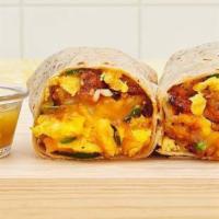 Spicy Hot Breakfast Burrito · Two scrambled eggs, jalapenos, breakfast potatoes, sriracha and melted cheese wrapped in a f...