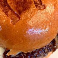 Old Horseshoe Burger · Irish cheddar, applewood smoked bacon, rosemary aioli and caramelized onions.