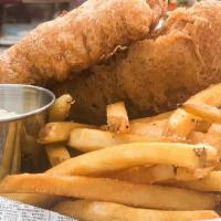 Fish & Chips · Beer battered Alaskan cod fish, house tartar sauce and spuds.