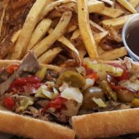 Chicago Italian Beef Sub · Chicago Style Italian Beef Sub with Papa's Au Jus & Topped with a Mix of Sweet & Hot Peppers