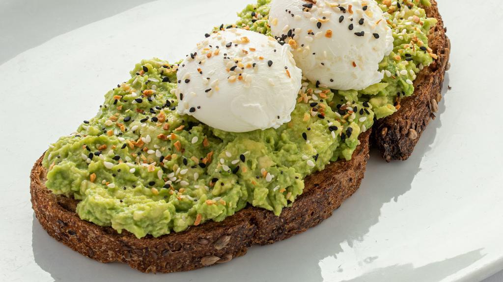 Avocado Toast · Artisan grain bread, avocado, two poached eggs, sesame seed blend