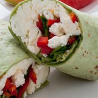 Egg White Veggie Wrap · Scrambled egg whites, spinach, red bell peppers, and feta cheese wrapped in a spinach tortil...