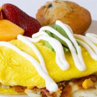 Omelet Your Way (3 Items) · 4 egg omelet with choice of cheese and 3 items.