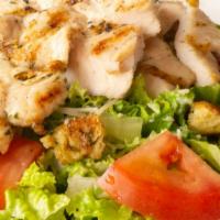 Chicken Caesar Salad · Grilled chicken, romaine lettuce, tomato, parmesan cheese, croutons, Caesar dressing.